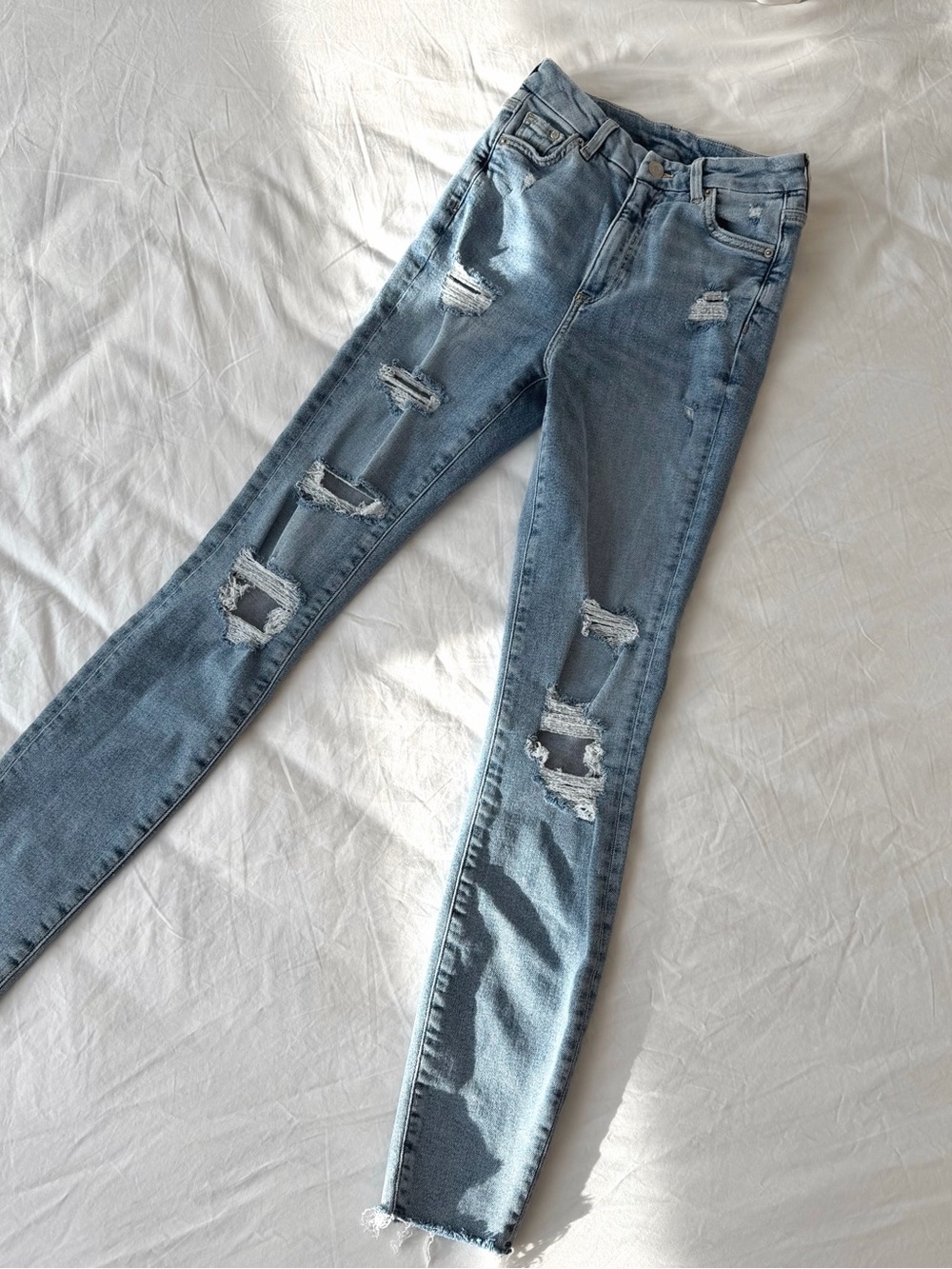 H&M Light Blue Distressed Skinny Jeans